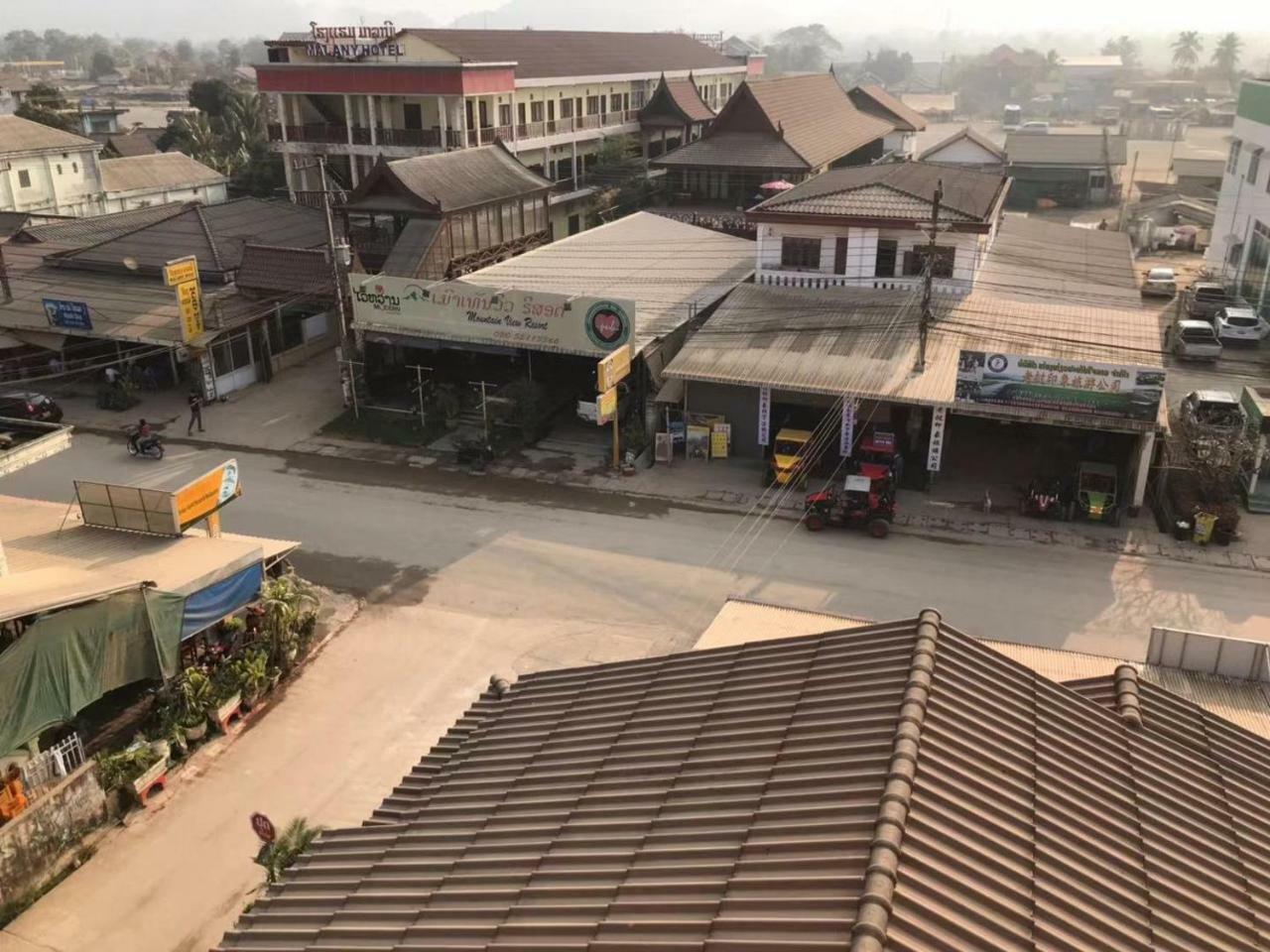 Pangu Hotel - 盘古酒店 Vang Vieng Exterior photo